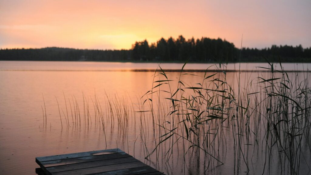 Peaceful sunset view over a calm lake — mindfulness and mental health therapy in Providence Rhode Island